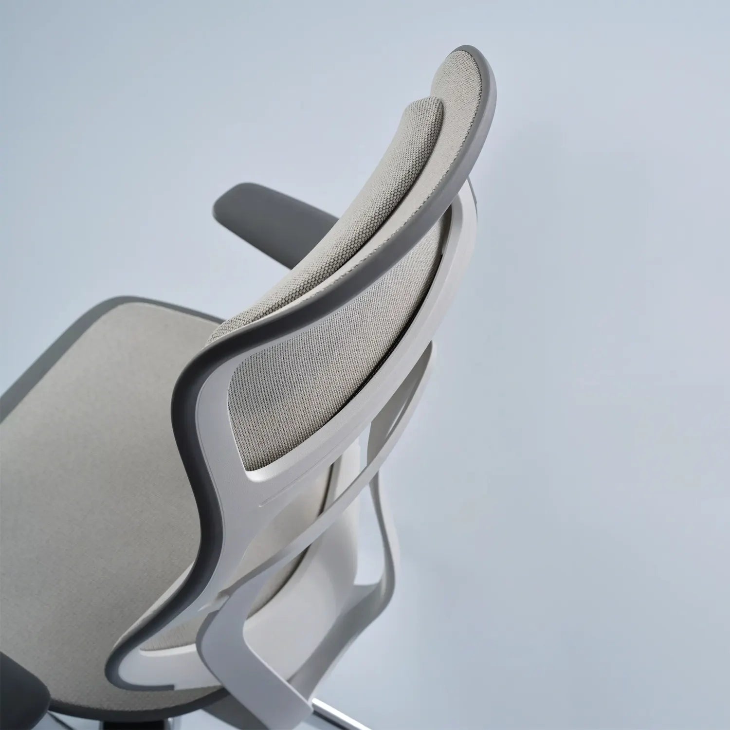 Steelcase Karman high back Seagull chair back view showcasing its ergonomic design and performance mesh.